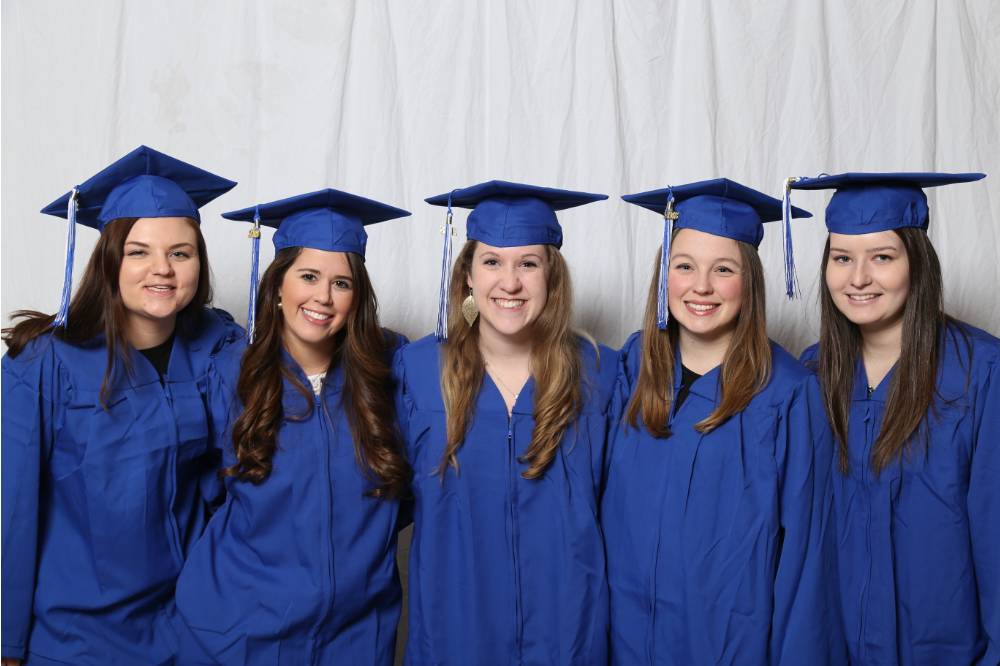 Five future alumnae pose together at GradFest